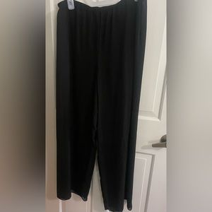 Alex evenings black dressy pants with sheer overlay.